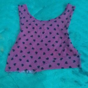 A pink heart crop top